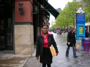 Betty Abah reporting on the streets of Denver, Colorado, 2006.